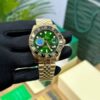 ROLEX GMT MASTER II GOLD GREEN DIAL
