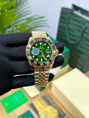 ROLEX GMT MASTER II GOLD GREEN DIAL